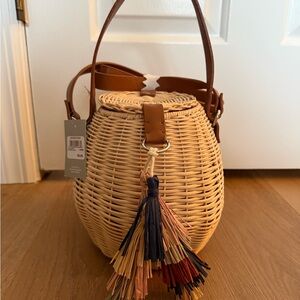 Stylish Tan Woven Basket Bag with Tassels